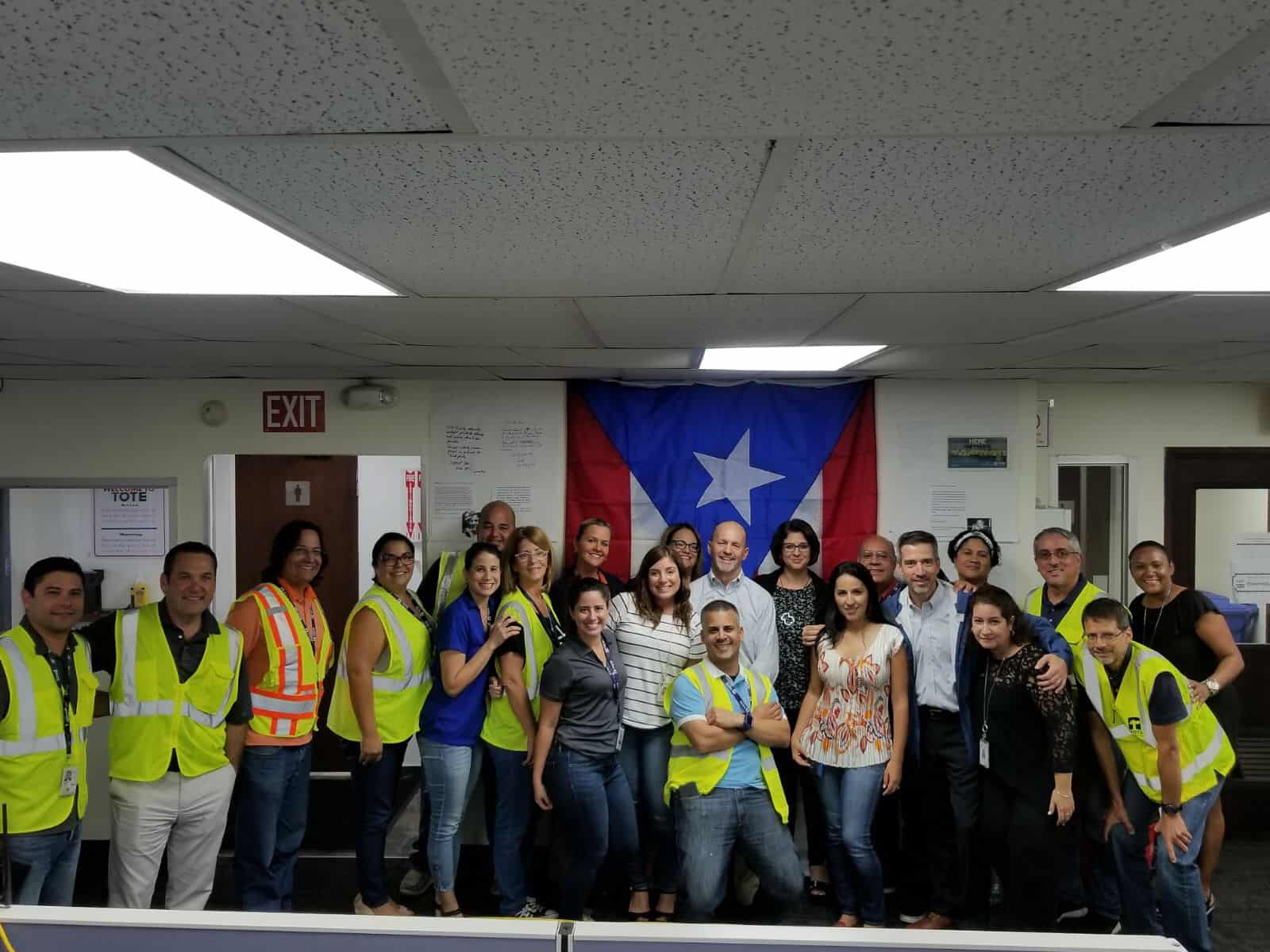 TOTE Maritime Puerto Rico gathers for a photo while working to help those affected by the hurricane.